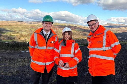 David Chadwick MP & Jane Dodds MS standing over the disused coal mine at the Global Centre for Rail Excellence site