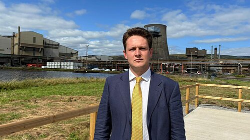 David Chadwick in front of decomissioned blast furnace
