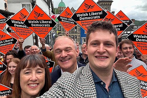 David Chadwick, Sir Ed Davey and Jane Dodds MS take a selfie with Lib Dem Activists.